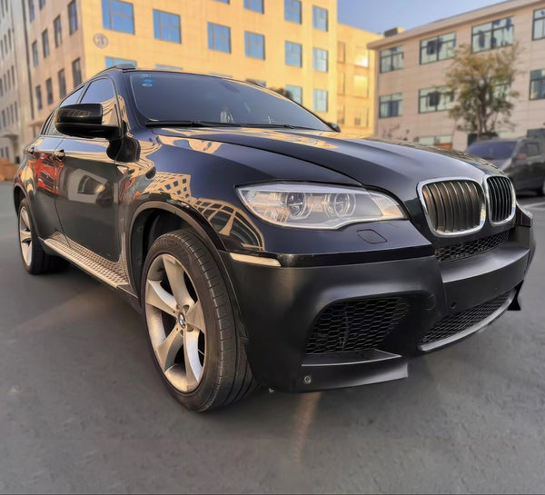 IKON MOTORSPORTS, Front Bumper Cover Compatible With 2008-2014 BMW X5 E71, PP Unpainted Black X6M Style Front Bumper Conversion Kit + Foglight Grilles + Upper & Lower Grilles With PDC Sensor Holes