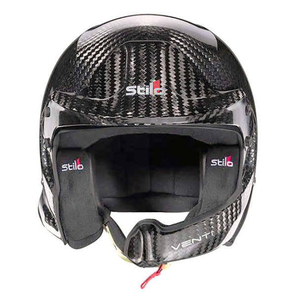 A dynamic shot of the Stilo Venti WRC Carbon Fiber 8860-2018 helmet, highlighting its aerodynamic shape and carbon fiber construction, perfect for professional motorsport.