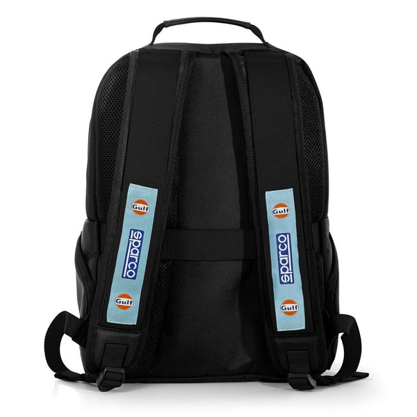 Rear view of the Sparco Gulf Stage Rucksack showing padded ergonomic straps with Gulf and Sparco branding, breathable mesh back, and trolley strap