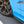 AutoTecknic F90 M5 Carbon Fiber Splash Guard installed at rear of driver side front wheel well