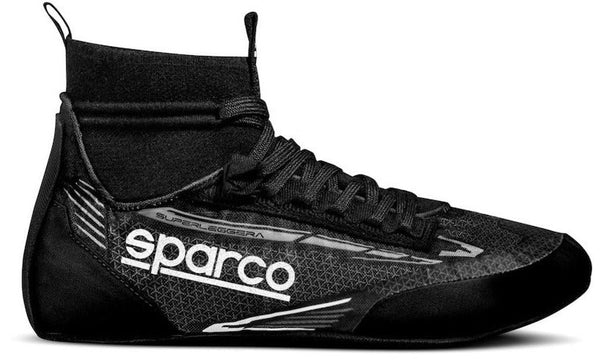 Sparco Superleggera Racing Shoes in action on the track, the top choice for motorsport professionals seeking lightweight and durable footwear Image