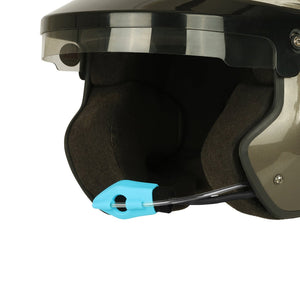 Close-up of a helmet with a blue chin strap on a white background