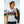  Sparco Martini T-Shirt hero image with woman wearing white shirt and leather jacket at racetrack -image