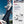 ifestyle image of Sparco S-Time Martini Racing shoes worn on track with bold Martini Racing colors

