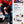 Lifestyle hero image of Sparco S-Urban Martini Racing shoes with 80s-style design, red-white-blue colorway, and amber rubber outsole